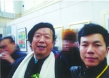 与中国电影家协会副主席，著名导演李前宽合影